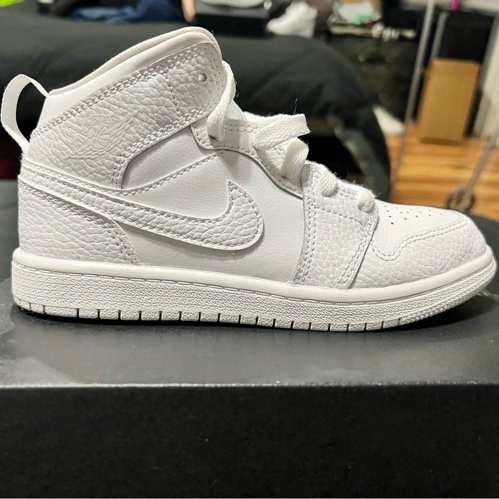 Kids Jordan AJ1 all white. Very rare to find.